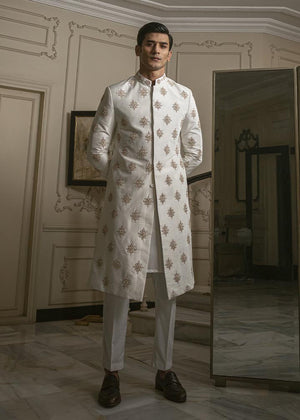 WHITE RAW SILK SHERWANI WITH MOTIFS